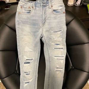 American Eagle size two ripped jeans with covering